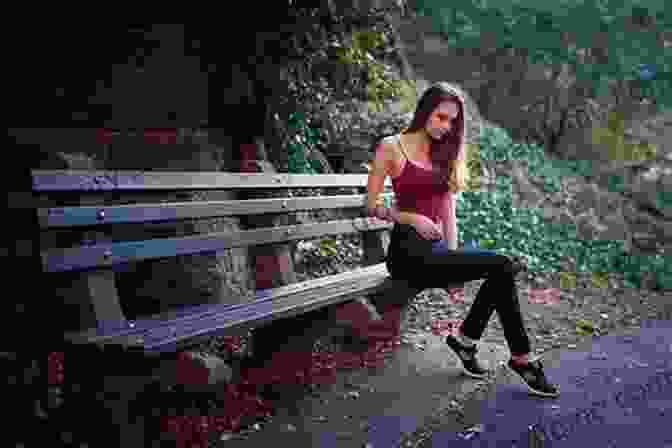 A Woman Sitting On A Bench In A Peaceful Garden, Surrounded By Flowers And Greenery. Consolation: The Spiritual Journey Beyond Grief