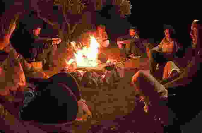 Group Of People Gathered Around A Campfire, Laughing And Sharing Stories Going Off The Grid: The How To Of Simple Living And Happiness (Off The Grid 1)