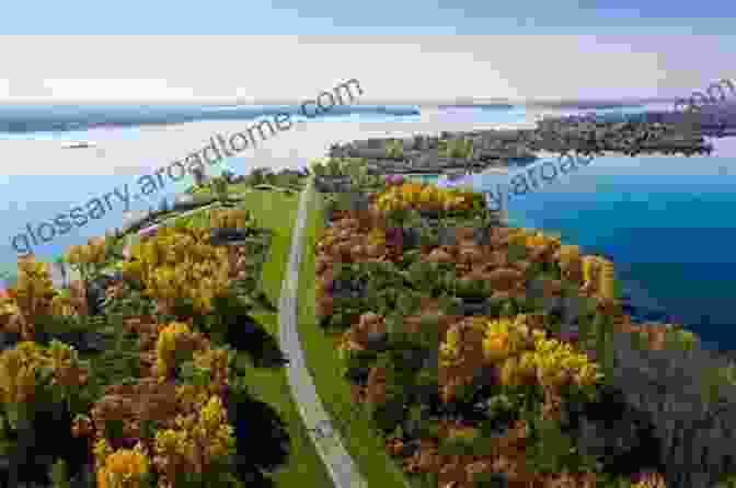 The St. Lawrence River In Spring, With Lush Greenery And Blooming Flowers Seasons Of The St Lawrence